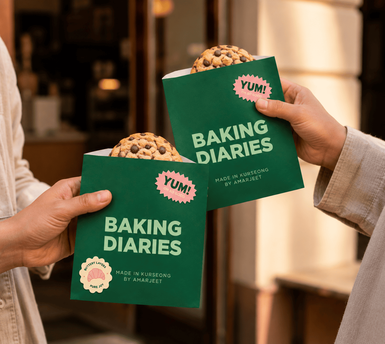 Deep green Baking Diaries takeaway boxes with cookies