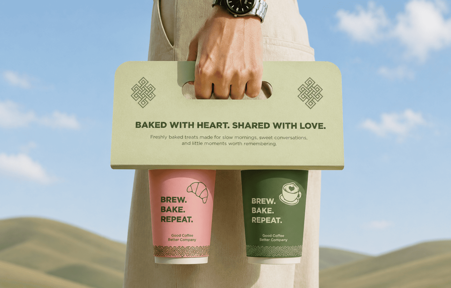 Baking Diaries branded coffee carrier held outdoors